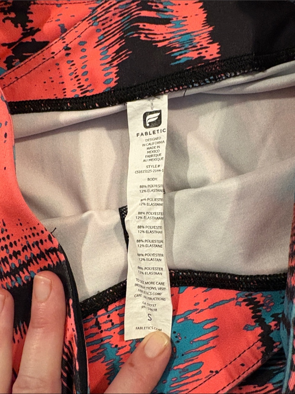 Fabletics Capri Leggings - Coral, Teal & Black - Picture 2 of 6